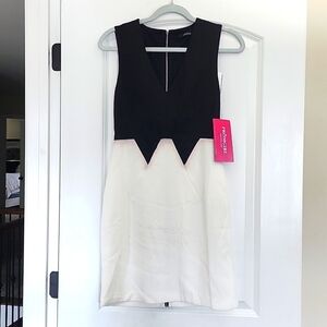 PROM GIRL Black & White sleeveless knee length assymetric design dress small